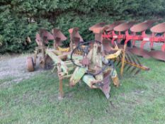 Dowdeswell DP8 4f reversible plough with Claydon furrow cracker. Serial No: 214751668