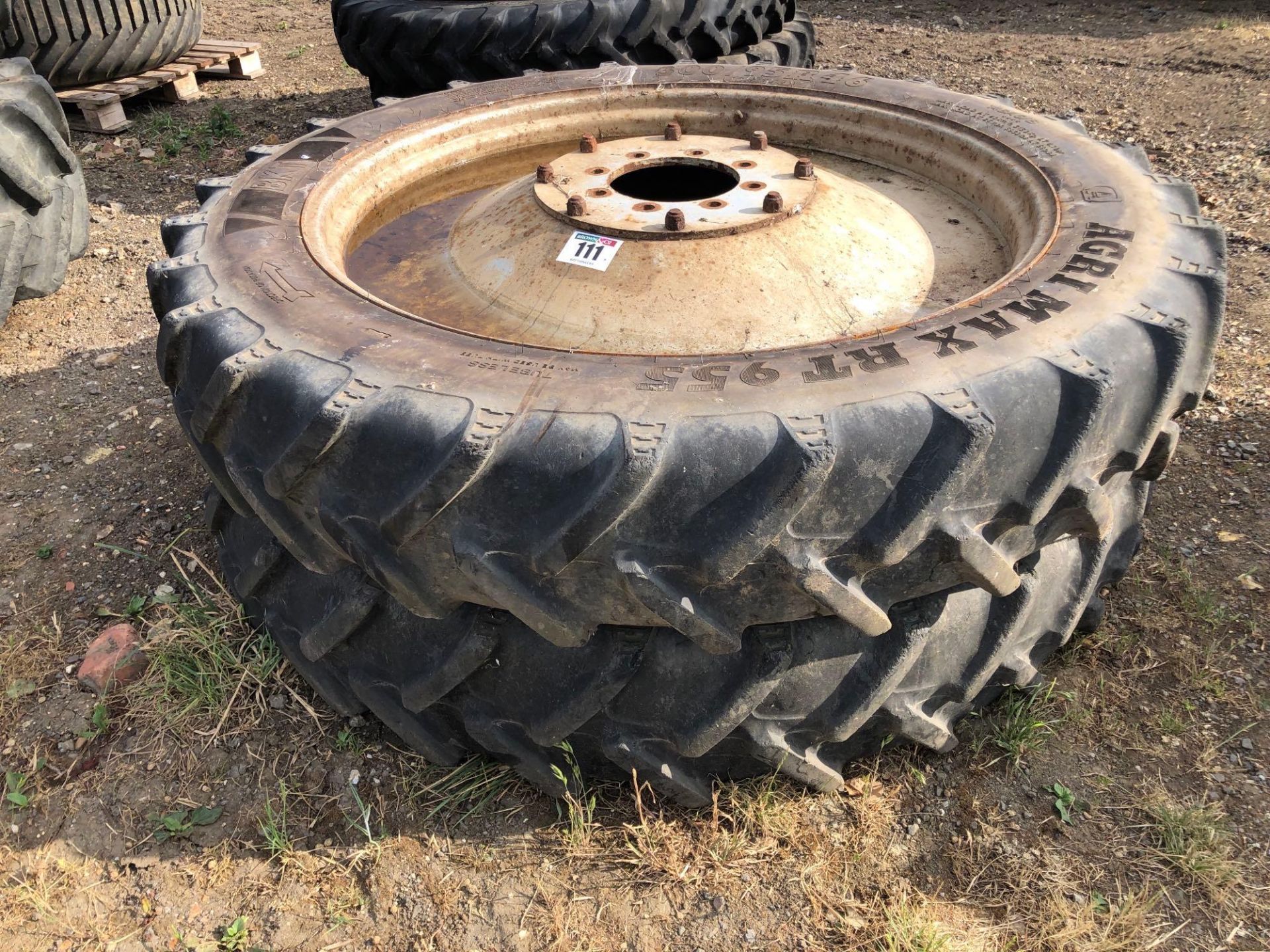 Pair BKT 300/95R46 8 stud wheels and tyres