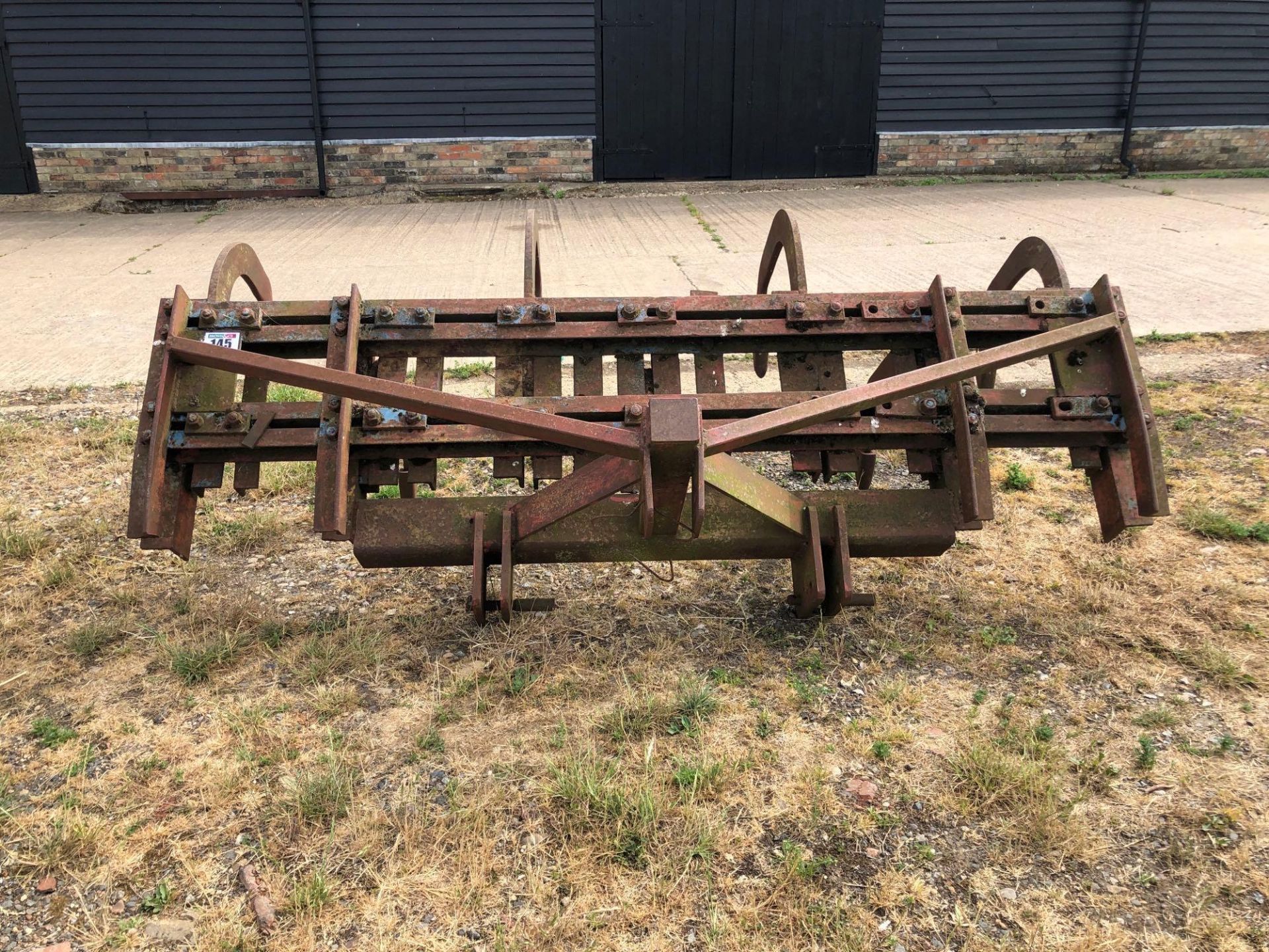 Fixed tine 7 leg 9ft cultivator, linkage mounted