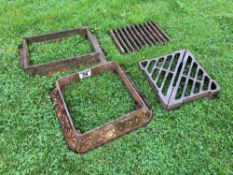 2No cast iron grates with surrounds