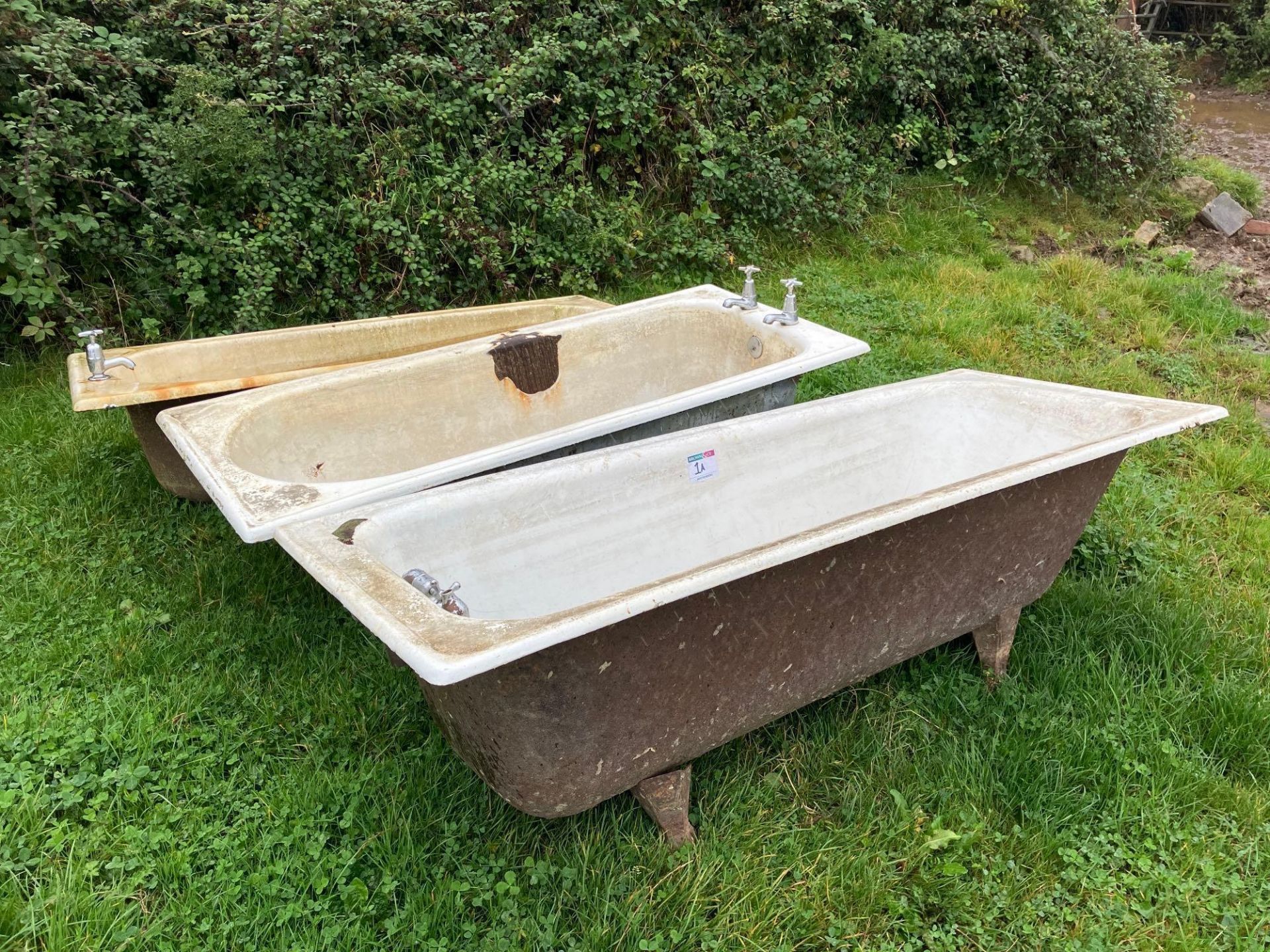 3No cast iron bath tubs