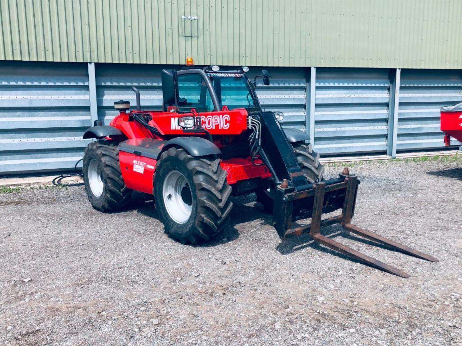 2010 Manitou MLT627 Turbo materials handler c/w air conditioned cab, pick up hitch, pin and cone hea