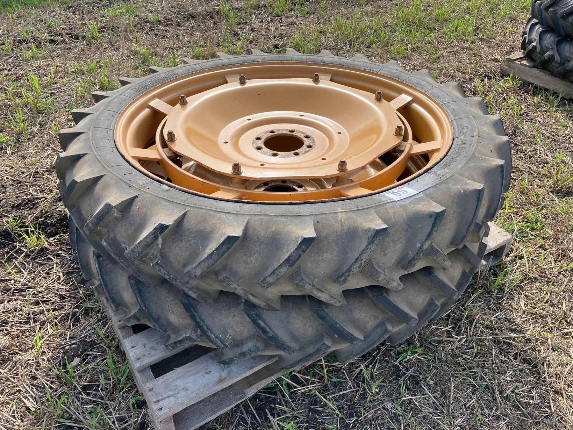 Pair Michelin 9.5-44 row crop wheels and tyres with 8 stud centres suited to a Massey Ferguson