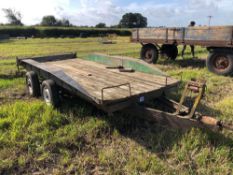 Twin axle car trailer with ball hitch and wooden floor
