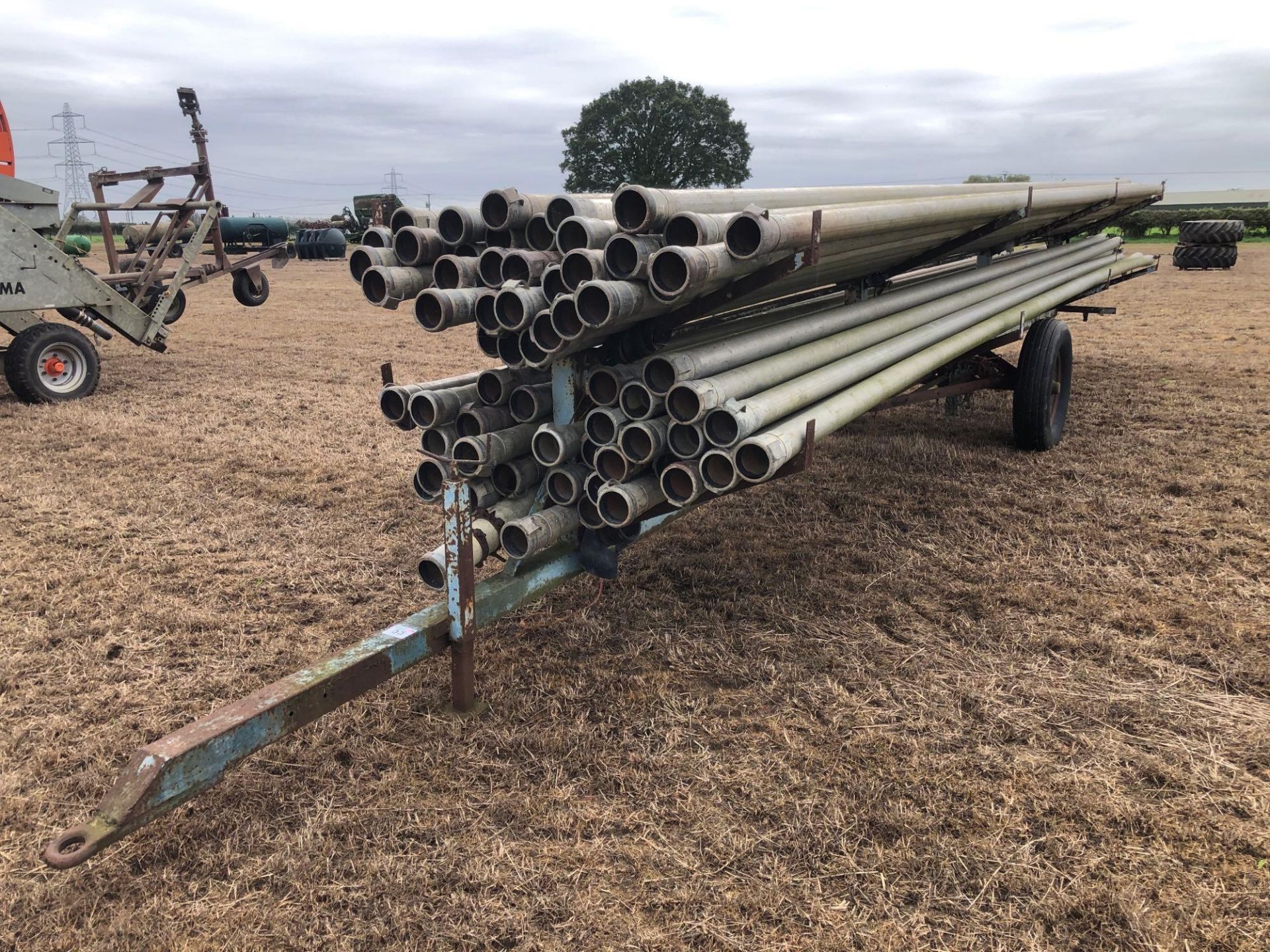 c.69No Javelin 4" irrigation pipes with pipe trailer