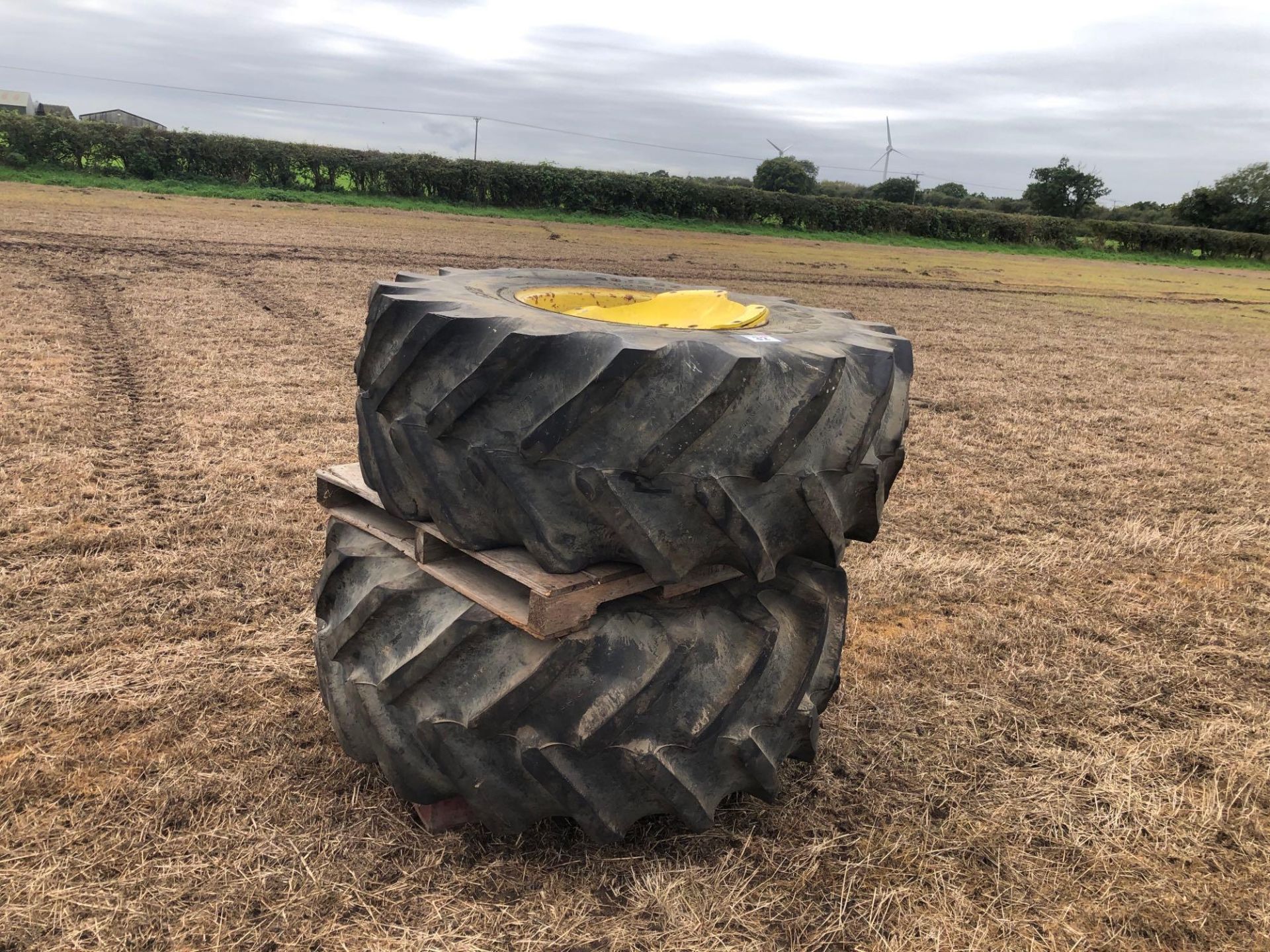 Pair Goodyear 23.1R26 front wheels and tyres to suit John Deere