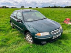 1996 Rover 216 Sli petrol automatic car with cloth upholstery. Reg No: N216 FFA. Mileage: 91,379. Cu