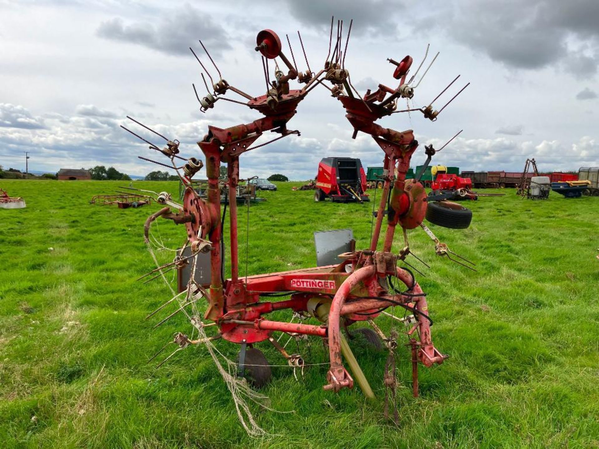 Pottinger HIT69N 6 rotor hydraulic folding tedder, linkage mounted