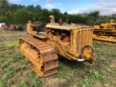 1948 Caterpillar D4 wide gauge metal tracked crawler with 16" tracks, swinging drawbar and 2 rear sp