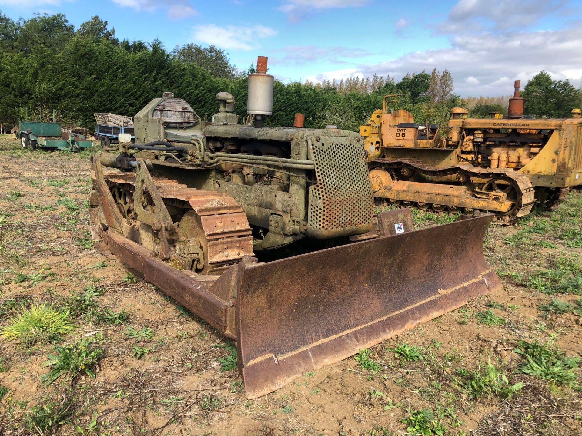 1948 Caterpillar D4 metal tracked crawler with 16" tracks, swinging drawbar, front grading blade and