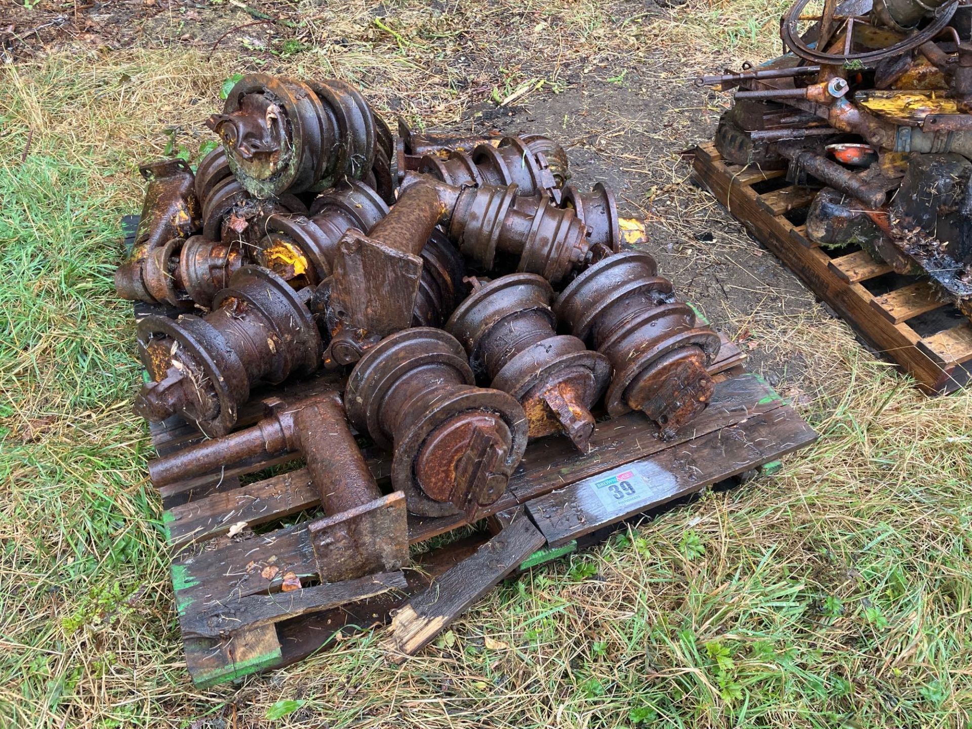 Quantity miscellaneous Caterpillar track rollers and parts