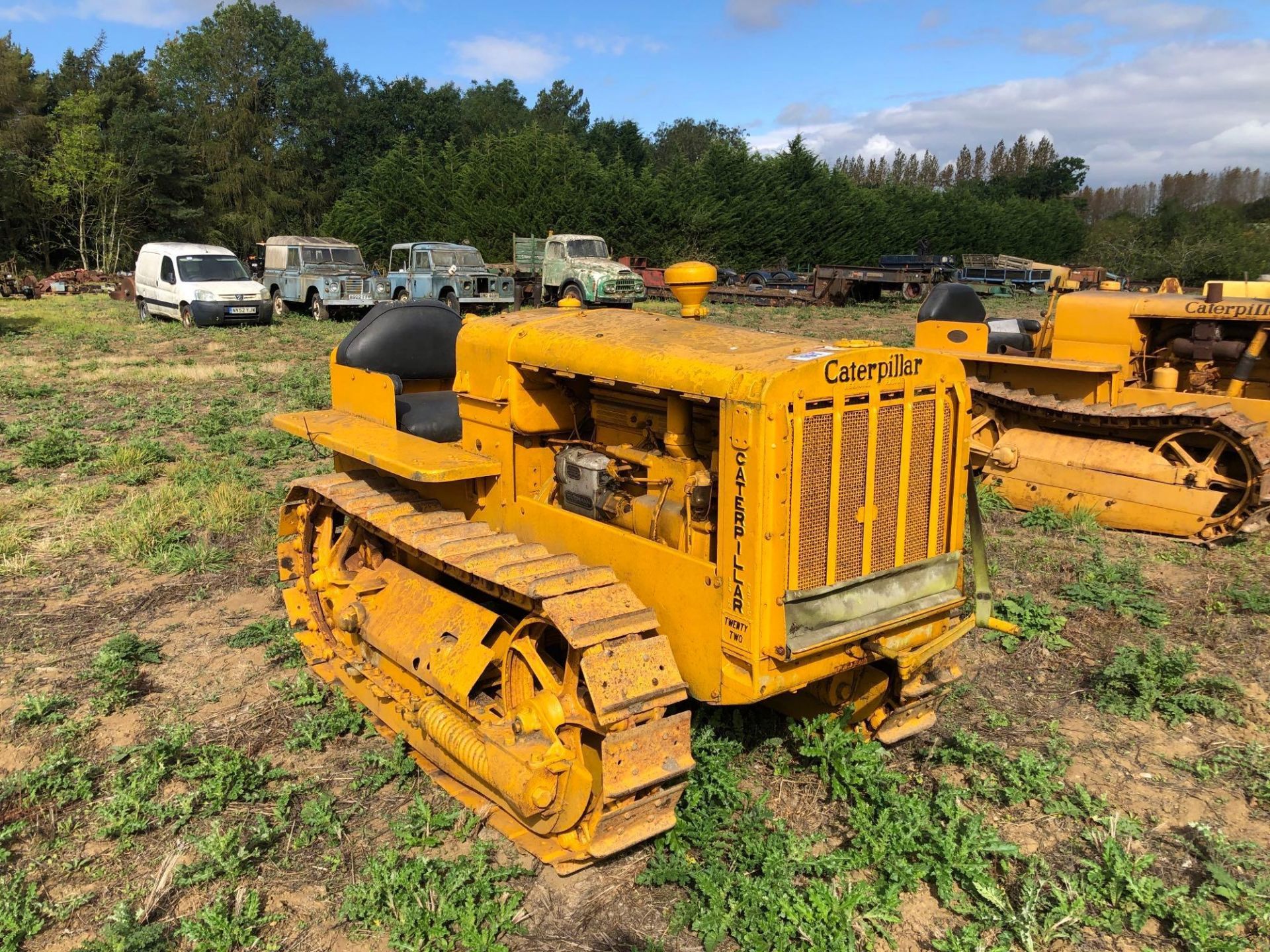 1937 Caterpillar 22 metal tracked crawler with 10" tracks, petrol engine and swinging drawbar. Seria