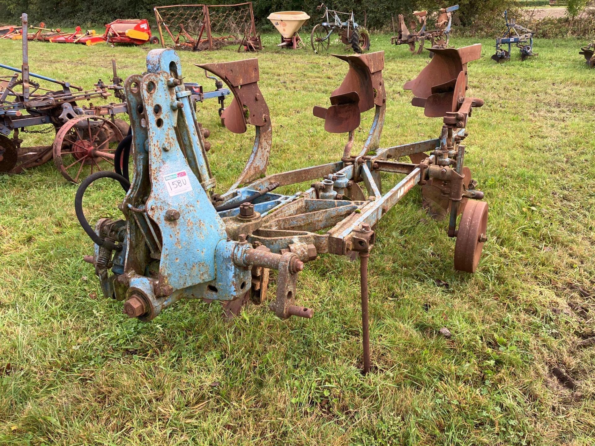 Ransomes TS84 3 furrow reversible plough with skimmers and depth wheel