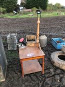 Wooden table, chain saw sharpener and light