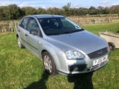 2006 Ford Focus LX 5 door silver car, automatic, cloth upholstery on 205/55R16 wheels and tyres. Reg