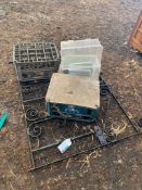 Garden gate and plastic milk crates