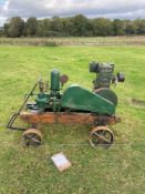 Lister petrol stationary engine on 4-wheel trolley c/w pump. No VAT.