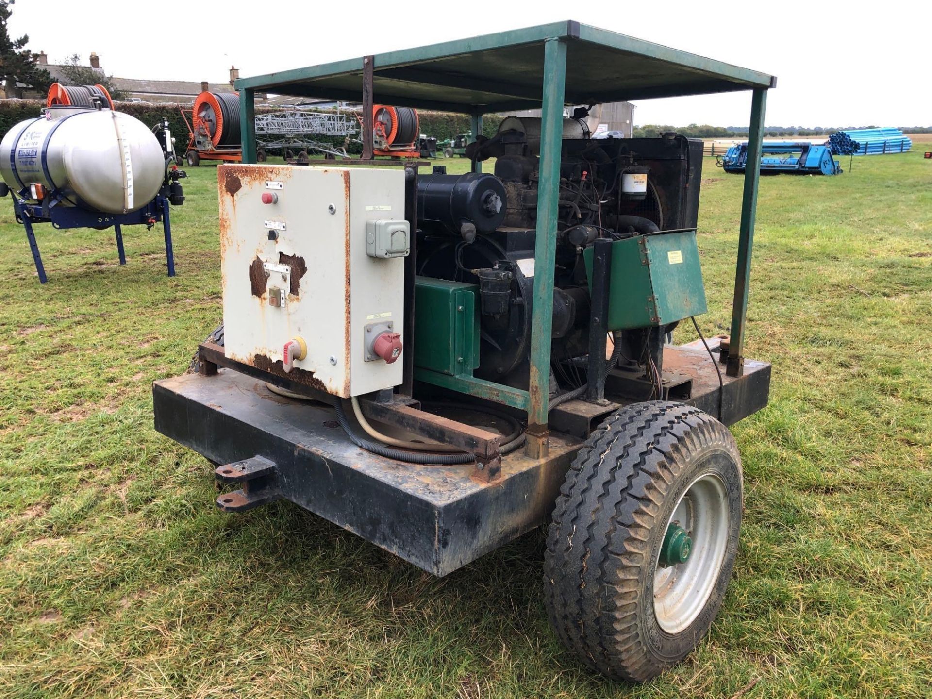 BMC 4cyld 20kVA trailed diesel generator with 32amp 3phase, 16amp 3 phase and 13amp single phase out - Image 4 of 6