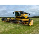2015 New Holland CR9080 4wd combine harvester with 30ft Varifeed header and trolley, twin side knive