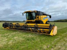 2015 New Holland CR9080 4wd combine harvester with 30ft Varifeed header and trolley, twin side knive