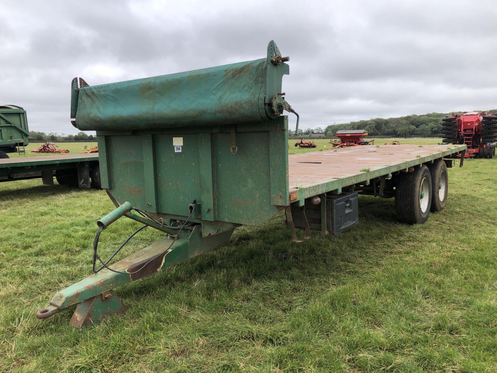 2006 Bailey 26ft flat bed trailer with manual rollover sheet twin axle on 385/65R22.5 wheels and tyr