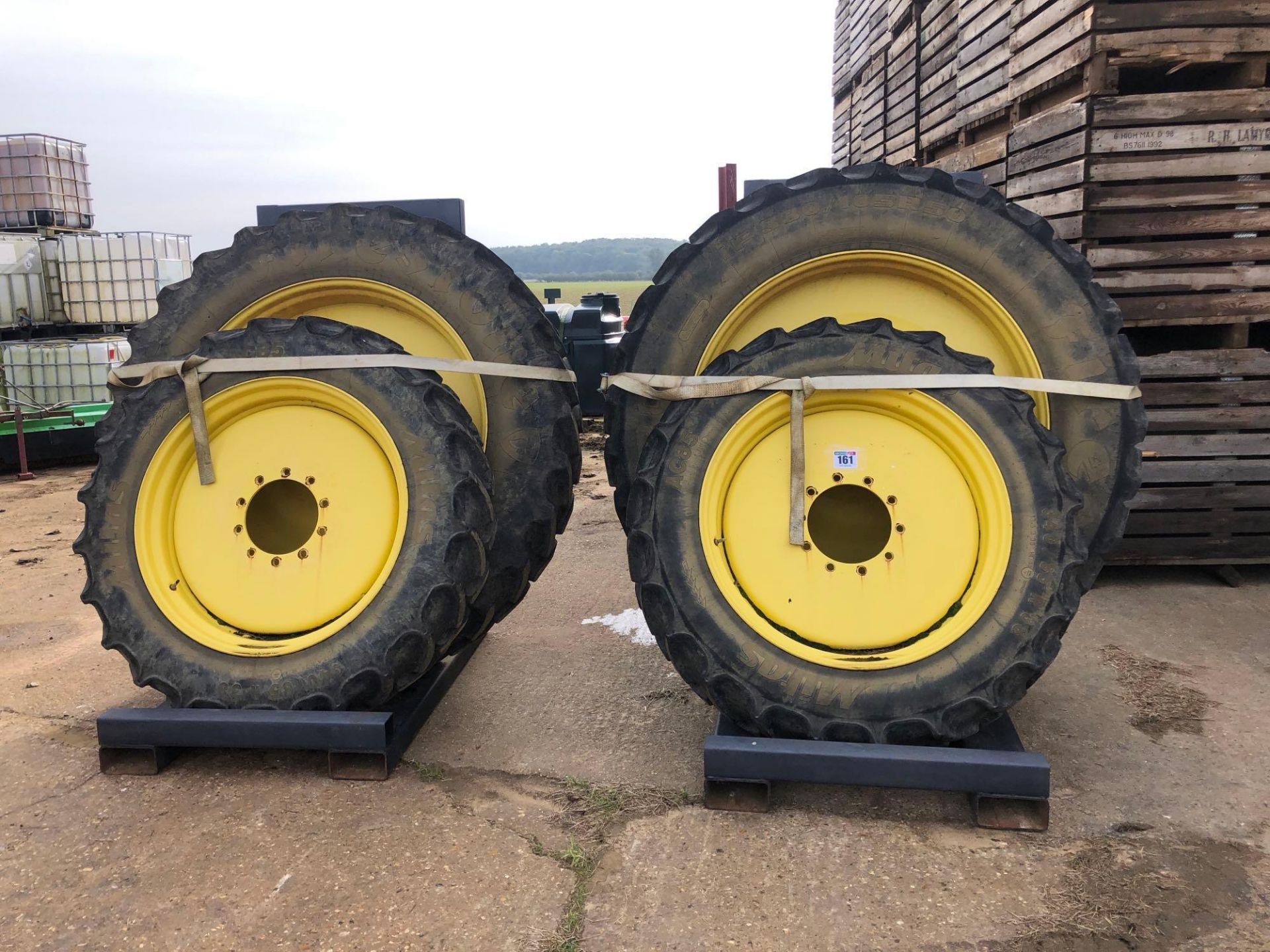 Set Mitas 340/85R38 front and Firestone 380/105R50 rear wheels and tyres with John Deere centres