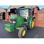 1993 John Deere 6300 Power Quad tractor on 10.0-16 front and 13.6r38 rear wheels and tyres. On farm