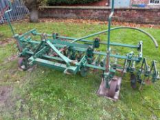 H Leverton & Co sugar beet 6 row inter-row cultivator, set for 20inch.  Manual and seat in the offic