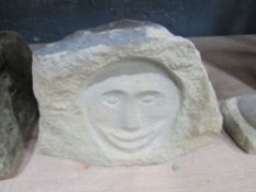 Face Carved In Natural Stone