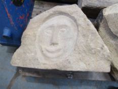 Face Carved In Natural Stone