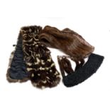 A fur wrap, a mink stole, and an astrakhan collar