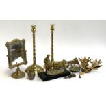 A number of brass figurines to include shepherd and sheep, quail, fox, cow ashtray, a pair of tall
