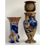 A Charlotte Rhead Bursley ware hexagonal vase with tube lined floral peony design, 20cmH, together w