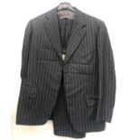 A Bradbury & Barnes, Cheltenham single breasted pin stripe two piece suit with tunnel top and narrow