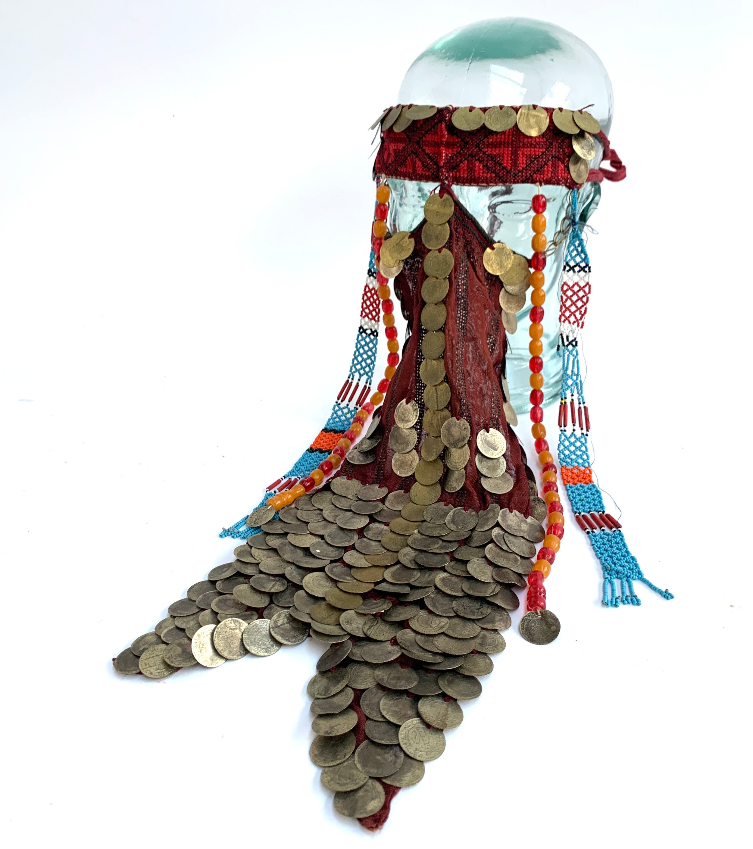 A Palestinian bridal wedding headdress and burqa veil, the woven cap mounted with coins from the - Image 5 of 10