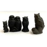 M W Pierce, a resin figure of an owl, signed, 9cm high; together with three other owl figurines (4)