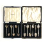 A cased set of six Mappin & Webb silver coffee bean terminal spoons, together with a further cased