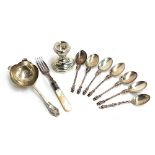 A set of seven silver 'apostle' teaspoons by Martin, Hall & Co (Richard Martin & Ebenezer Hall); a