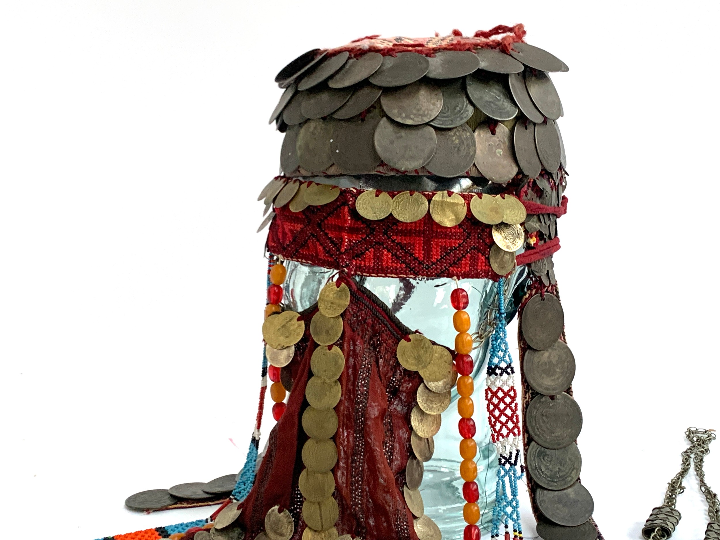 A Palestinian bridal wedding headdress and burqa veil, the woven cap mounted with coins from the - Image 2 of 10