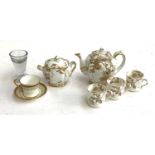 A Haviland & Co Limoges part coffee service comprising coffee pot, sugar bowl and 3 coffee cups,