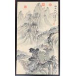 A Chinese painting on silk of a mountainous landscape, 88x49cm