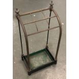 A heavy brass and copper stick stand, 30cmW