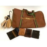 A Caractere canvas holdall, together with a number of gents leather wallets, etc