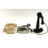 A lot of three vintage and vintage style telephones