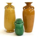 Two small yellow glaze Chinese vases with elephant handles, approx 12cmH, together with a small