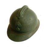 A WWI French M15 helmet with RF badge
