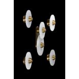 A group of five modern marble and metal wall lamps in art deco style, the double disk example 58cm