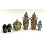 A pair of Chinese transfer ware and hand painted lidded vases with, heightened in gilt, marks to