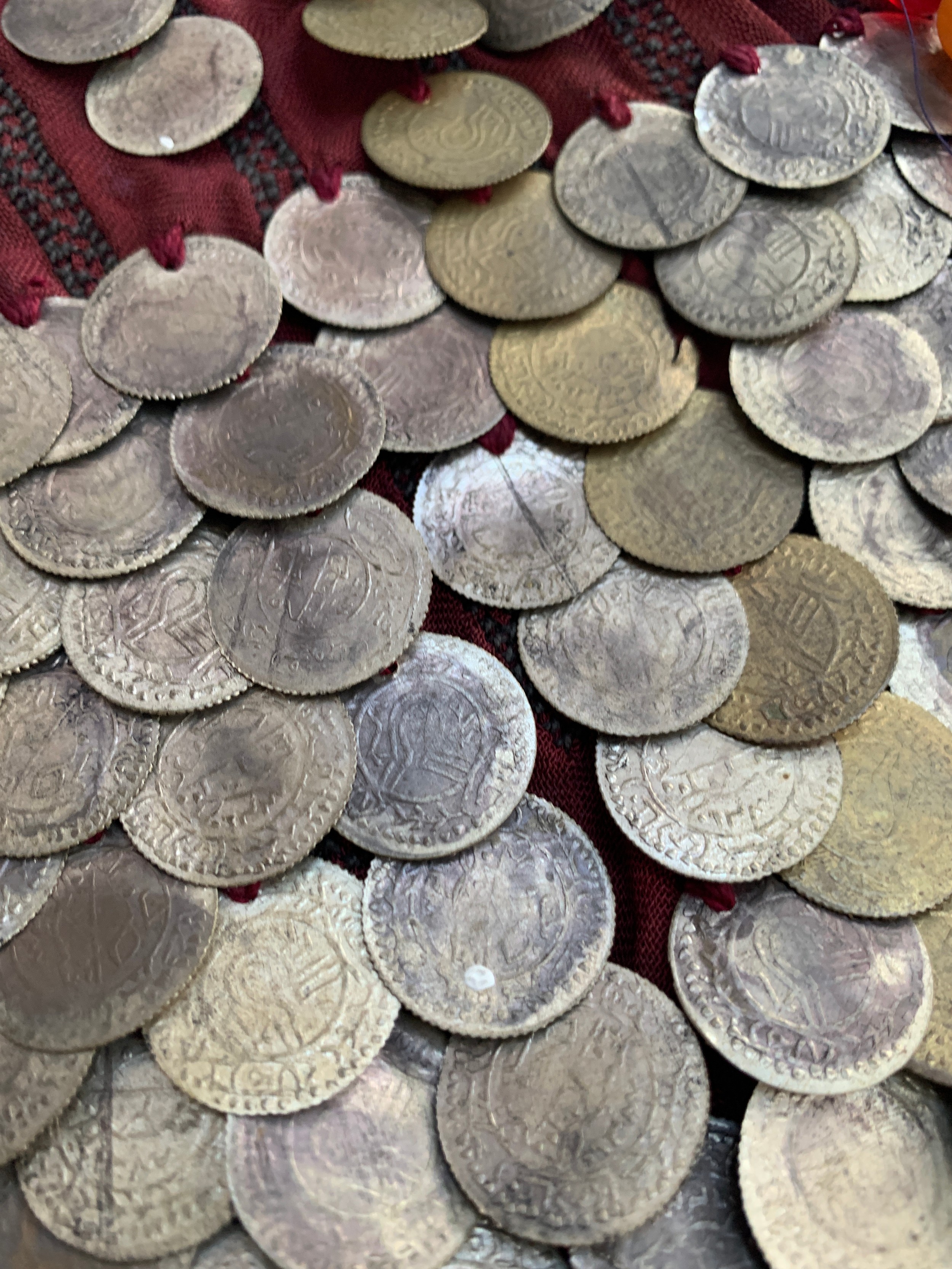 A Palestinian bridal wedding headdress and burqa veil, the woven cap mounted with coins from the - Image 4 of 10