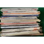 A mixed box of vinyl LPs and singles to include Elvis Presley, etc